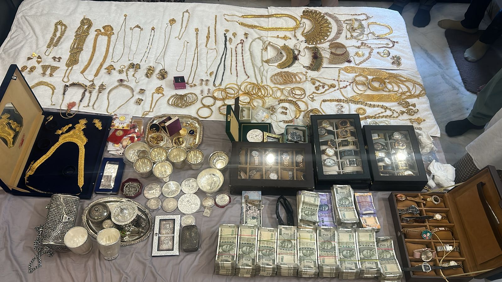 <div class="paragraphs"><p>Officials find cash, gold jewellery and other valuables at the property belonging to Athhar Ali, Deputy Controller of Legal Metrology, Bengaluru Division. </p></div>